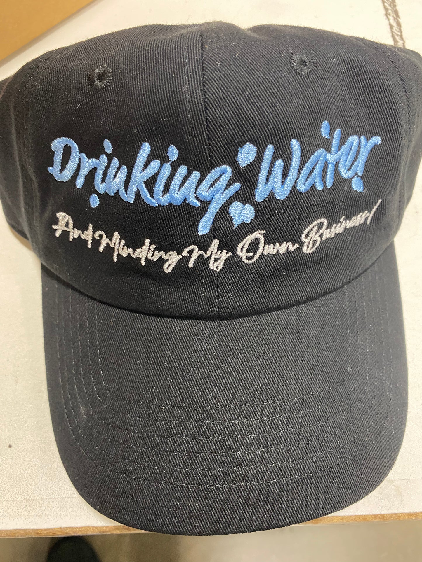 Product Details A year-round and trendy black fitted cap from our Signature Collection with iconic heritage embroidery.  One Size Embroidered accents the front panel Back strap for a comfortable, adjustable fit Six-panel construction with embroidered logo